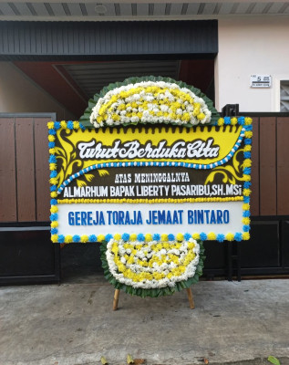Papan Bunga Duka di Kota Bambu Selatan